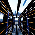 Futuristic Corridor Interior With Orange And White Lines Reflective Floor And Digital Screens