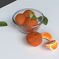 Fresh Oranges in Glass Bowl with Green Leaves and Peeled Segments