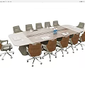Modern Conference Table In Meeting Room With Rolling Chairs Water Bottles And Documents