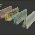 Four Concrete Curbs With Different Colors And Surface Markings On Dark Background