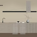 Modern Minimalist Kitchen Island With Stone Countertop Faucet White Vase Twigs And Black Strip