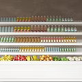 Multi Tiered Display Shelves with Assorted Bottled Drinks Fruits Vegetables and Eggs