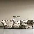 Ligne Roset Modern Sectional Sofa With Black And White Abstract Pattern Light Wall And Floor