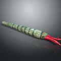 Green striped squid with long body and red tentacles on dark background