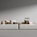Designer Beige Sectional Sofa With Multiple Cushions And Side Table In Minimalist Space