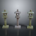 Three Stone Lanterns With Mossy Green And Light Stone Bases And Rounded Tops