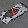 Gray Convertible Sports Car With Red Seats And Black Wheels Against Ancient Stone Columns