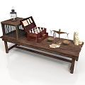 Woman Arranging Antiques On Wooden Table With Birdcage Chess Chest And Scrolls