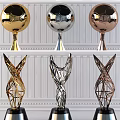 Various Designed Trophies with Gold Silver Bronze Finishes and Unique Shaped Decorative Bases