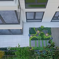 Water Fountain in Modern Courtyard with Lawn Stone Path and Green Plants