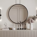 Elegant Console Table and Side Cabinet with Round Mirror Wall Sconces Decorative Vase and Trophies