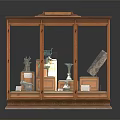 Wooden Display Cabinet With Glass Doors Showcasing Antique Sculptures Tools And Artifacts Inside