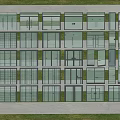 Aerial View Of Organized Glass Building Layout With Green Lawns And Gray Pathways