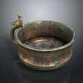 Ancient Bronze Sculpted Bowl With Bird Shaped Handle And Intricate Patterns