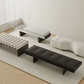Multiple Modern Upholstered Benches In Black And White On Rug Covered Floor Interior