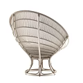 Modern Stylish Rattan Lounge Chair with Beige Cushion and Blue Decorative Pillow