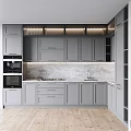 Modern Kitchen Interior With Gray Cabinets Marble Countertop Built-in Appliances And Under Cabinet Lighting