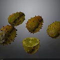 Fresh Kiwano Fruits Whole and Halved with Spiky Exterior and Green Flesh on Dark Background