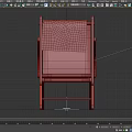 Wooden Folding Lounge Chair With Pink Towel And Colorful Patterned Seat