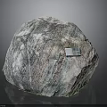 Natural Stone With Colorful Texture And Attached Metal Plaque