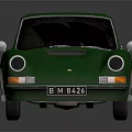 Green Classic Sports Car With Retro Design White Wheels And Black Windows