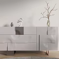 Modern White Sideboard with Glossy Finish Multiple Drawers and Decorative Vase Sculpture