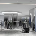 Modern Sleek Clothing Store Interior Design With Metallic Finish Fashion Racks And Artistic Mannequins
