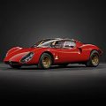 Red Classic Vintage Sports Car With Streamlined Body And Gold Wheels