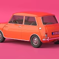 Vintage Orange Compact Car with Chrome Front Grille Headlights and Classic Wheels