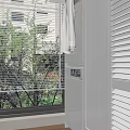 Clean Modern Entryway Interior With Hanging White Shirt Louvered Blinds And Whirlpool Washer Dryer