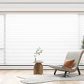 Modern Living Room Interior With Venetian Blinds Armchair Side Table And Green Plant