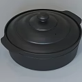 Black Cooking Pot As Kitchen Appliance With Open Lid Containing Meat Lime And Chili Ingredients