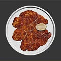 Spicy Seasoned Meat Slices Served On White Plate With Lemon Wedge