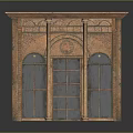 Ornate Copper Carved Door With Arched Windows And Intricate Patterns