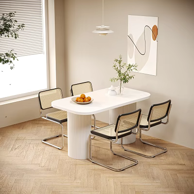 White Dining Table Set With Cylindrical Legs Metal Woven Chairs Fruit Bowl And Plant 3d model