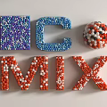 3D Letters M C MIX Design Composed Of Colorful Beads Purple Blue Red White