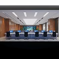 Wooden Paneled Conference Room With Rows of Tables Chairs Green Plants And Ceiling Lighting