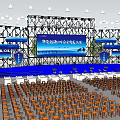 Large Outdoor Event Venue With Stage Setup Orange Chairs Blue Banners And Decorations