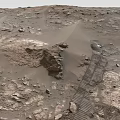 Martian Surface Landscape With Rocky Terrain Sand And Rover Tracks