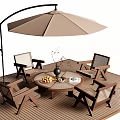 Outdoor Table with Umbrella Chairs Fruit Vase and Lantern on Wooden Deck