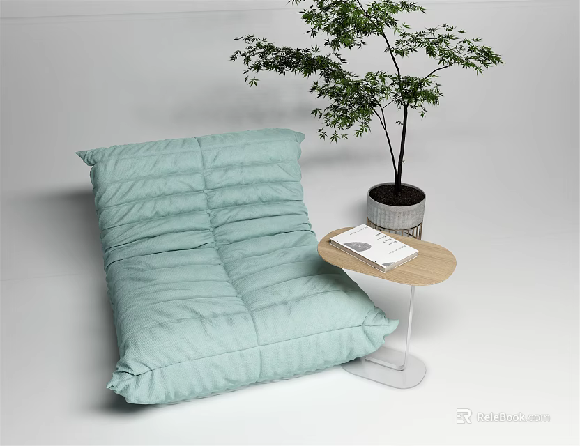Light Green Bean Bag Sofa With Small Side Table Book And Potted Plant 3d model 