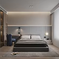 Modern Bedroom Interior With Large Bed Textured Headboard Wall Bedside Lamp Desk Chair And Rug