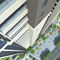 Modern Urban Commercial Complex Featuring Tall Buildings Greenery And Pedestrian Zones