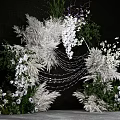 Elegant Floral Arch Decoration With White Purple Flowers And Feather Ornaments