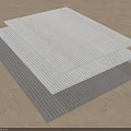 Three Stacked Square Rugs in Gray and White with Woven Texture on Wooden Floor