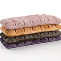 Quilted Velvet Mattresses Stacked In Pink Brown Dark Brown And Purple Shades