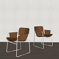 Brown Leather Leisure Chairs with Metal Frame on Wooden Floor Light Wall Background