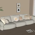 Plush Beige Three Seater Sofa With Decorative Pillows Floor Lamp Wall Art And Green Plant In Cozy Living Room