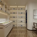Modern Specialty Store Interior Featuring Shelves With Display Items Central Long Table And Wooden Floor