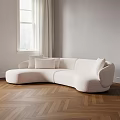 Plush White Abstract Shaped Sofa With Curved Design And Cushions In Herringbone Wooden Floor Interior